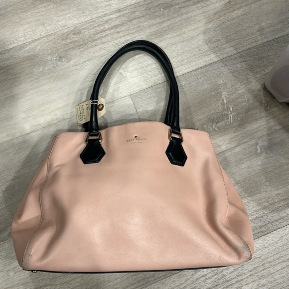 kate spade Handbags - Kate Spade pink soft hobo bag, inside off-white and black bowties good used con.